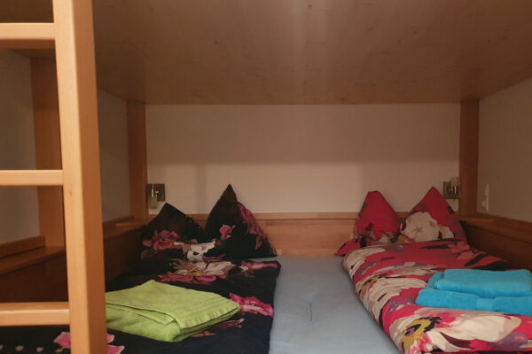 Schlafbereich in der Höss Alpin Lodge